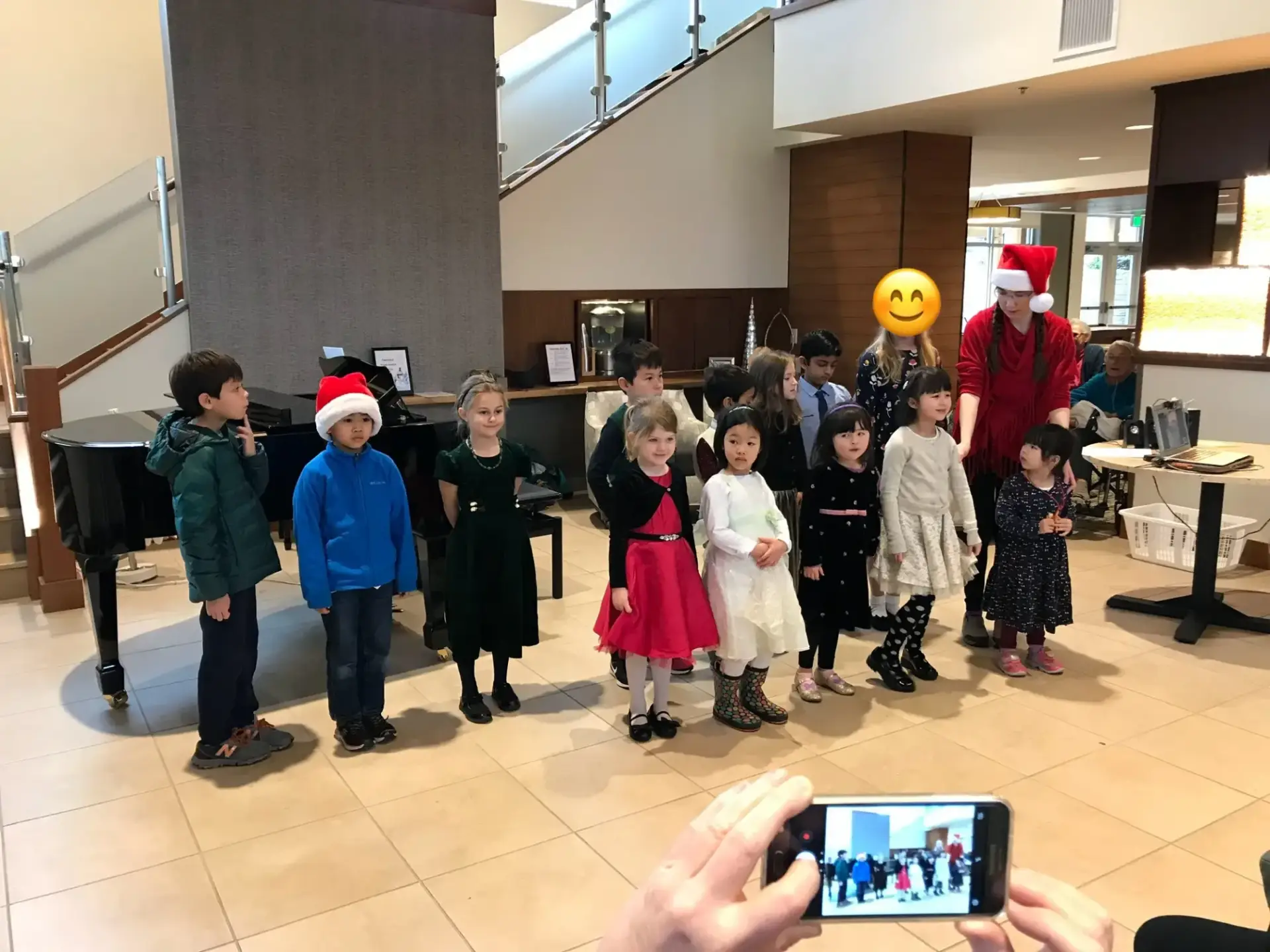 Sunset Suzuki piano students celebrating after group performance
